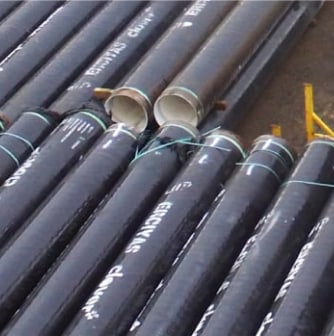 Steel pipes stacked in a yard